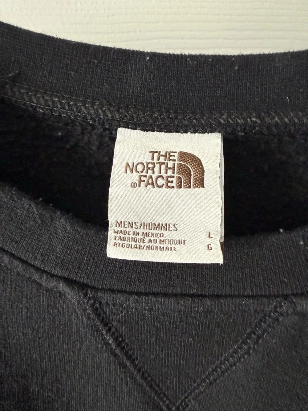 The North Face Black Crewneck Sweatshirt with Small Logo Patch